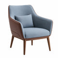 Sillón de tela roja y cuero sintético crema con estructura de madera